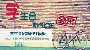 Nowy szablon PPT związku studentów na tle roweru z ceglaną ścianą